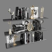 Decorative set with books and golden figures